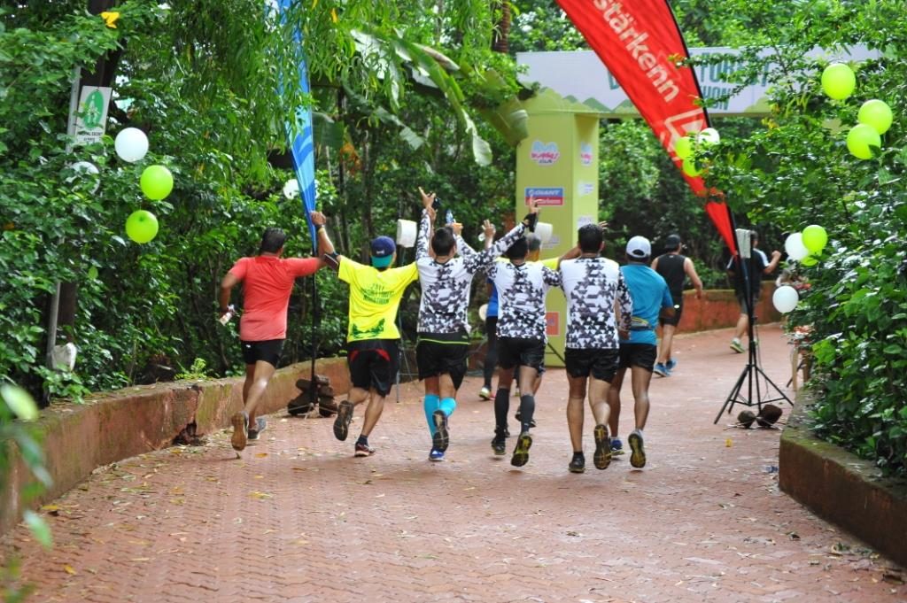 Group image of team mates finishing a long distance running race